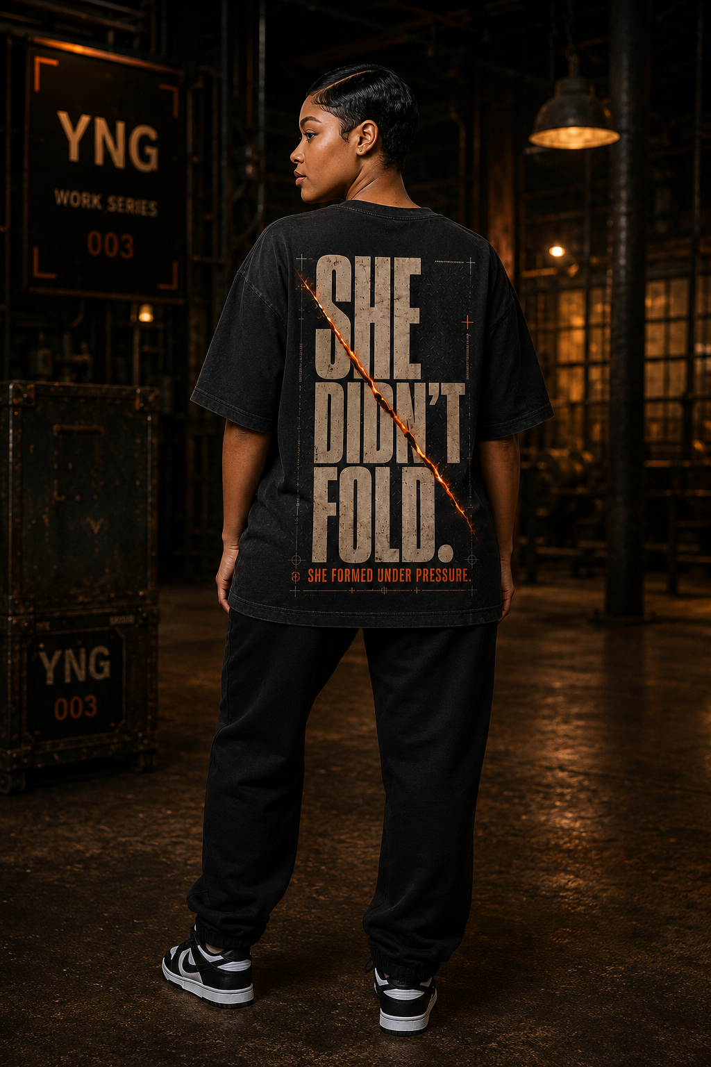 YNG She Didn't Fold Graphic Tee in black, front view with YNG Yield No Ground chest logo