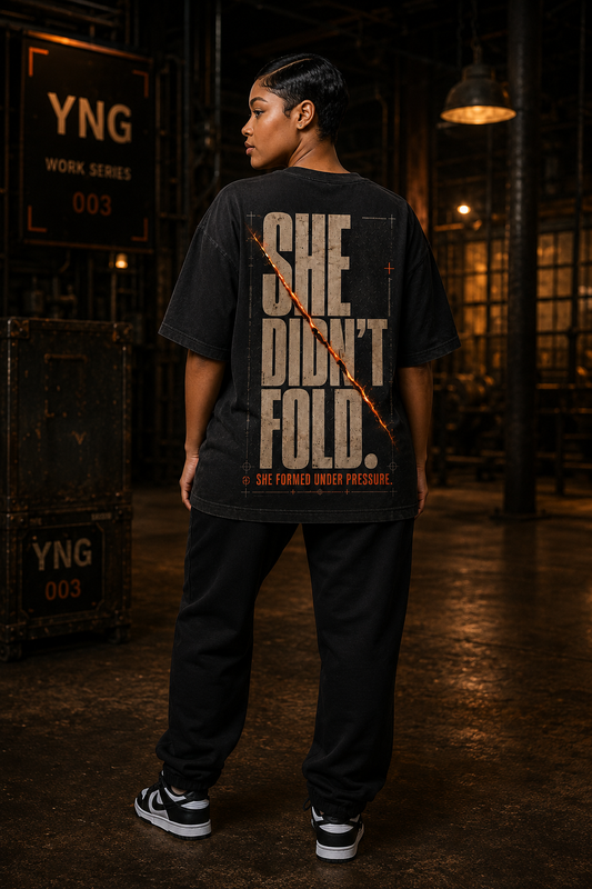 YNG She Didn't Fold Graphic Tee in black, front view with YNG Yield No Ground chest logo