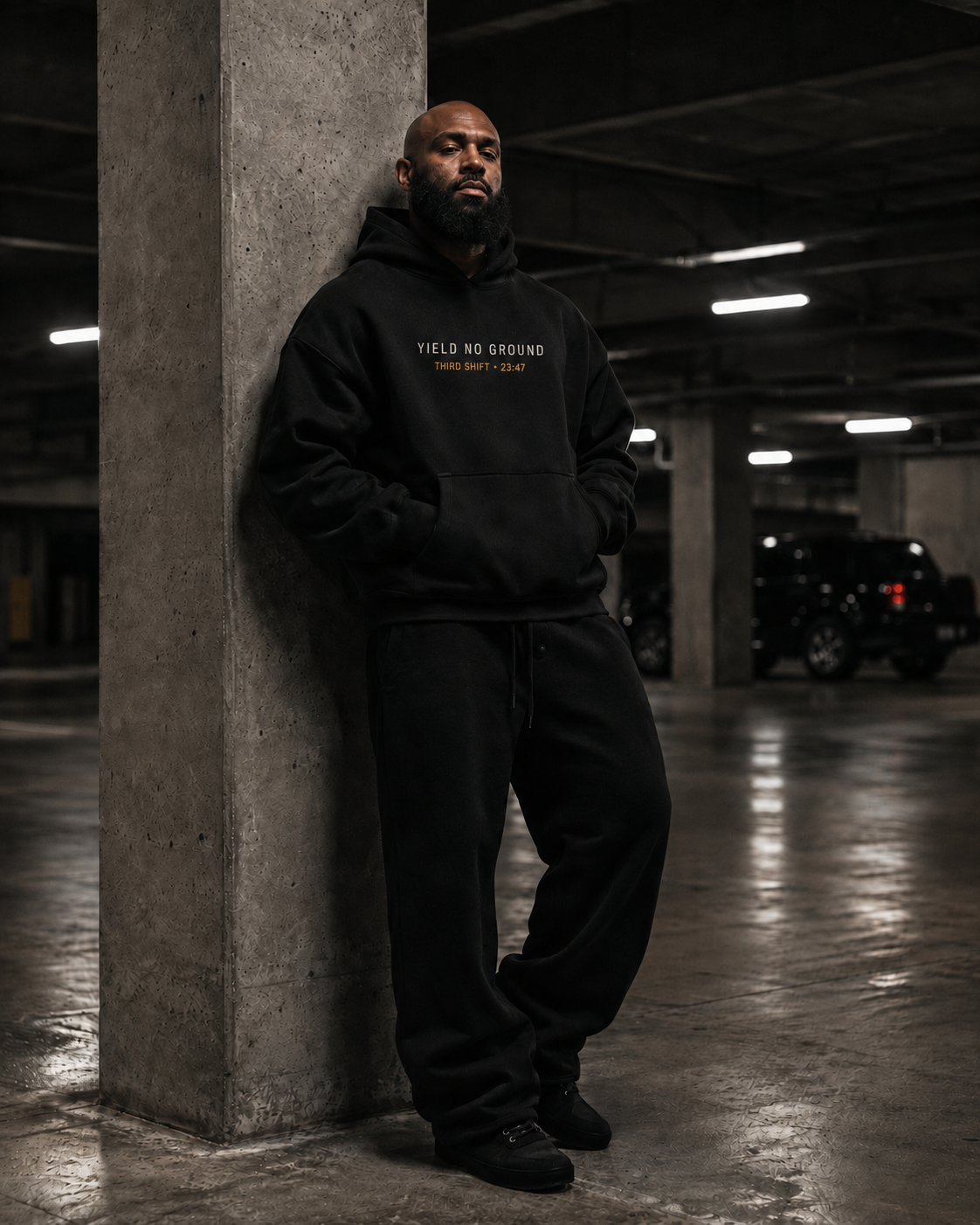 YNG Third Shift Hoodie in black, styled lifestyle photo